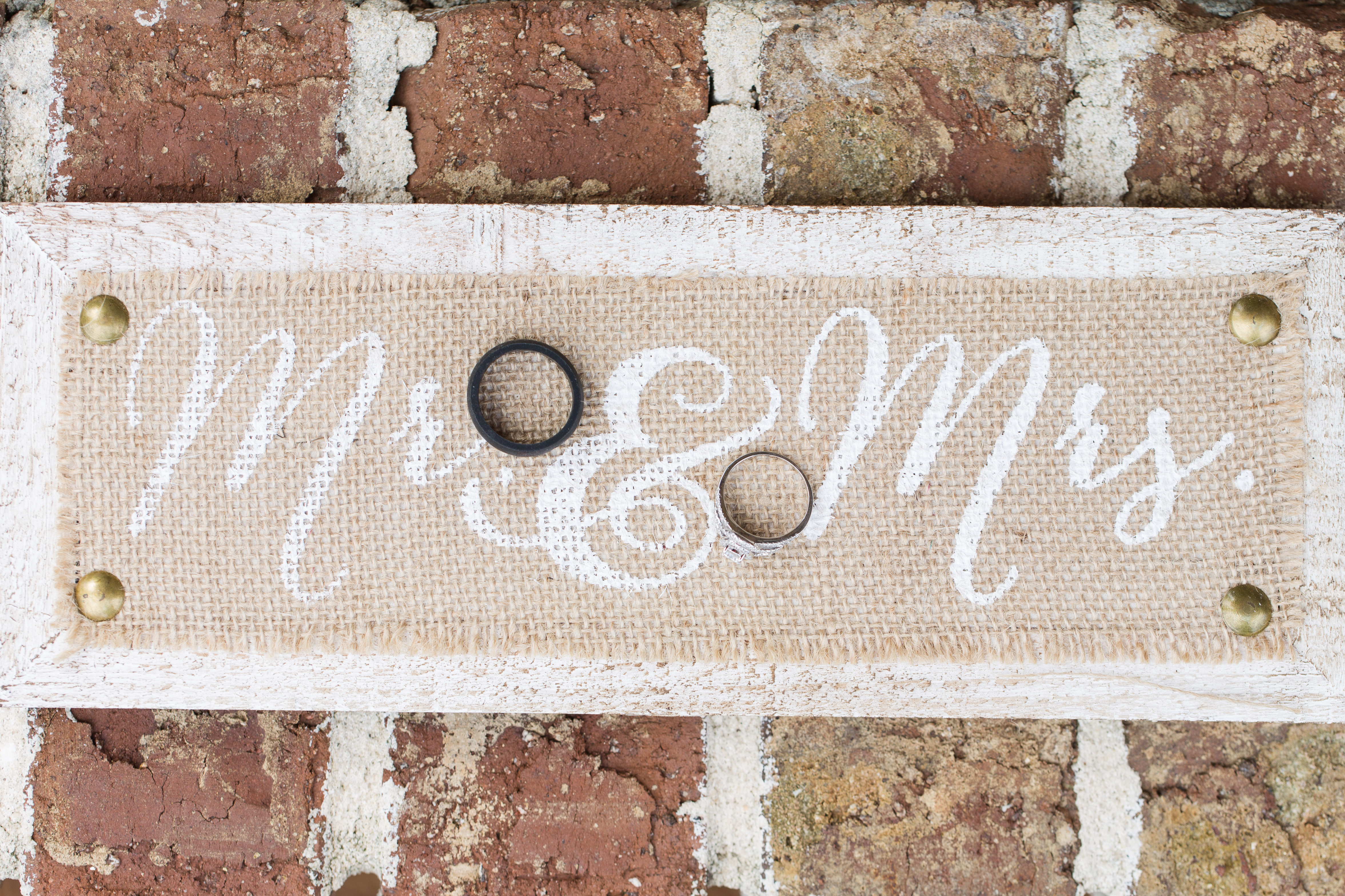 Burlap Mr. and Mrs. sign with wedding bands