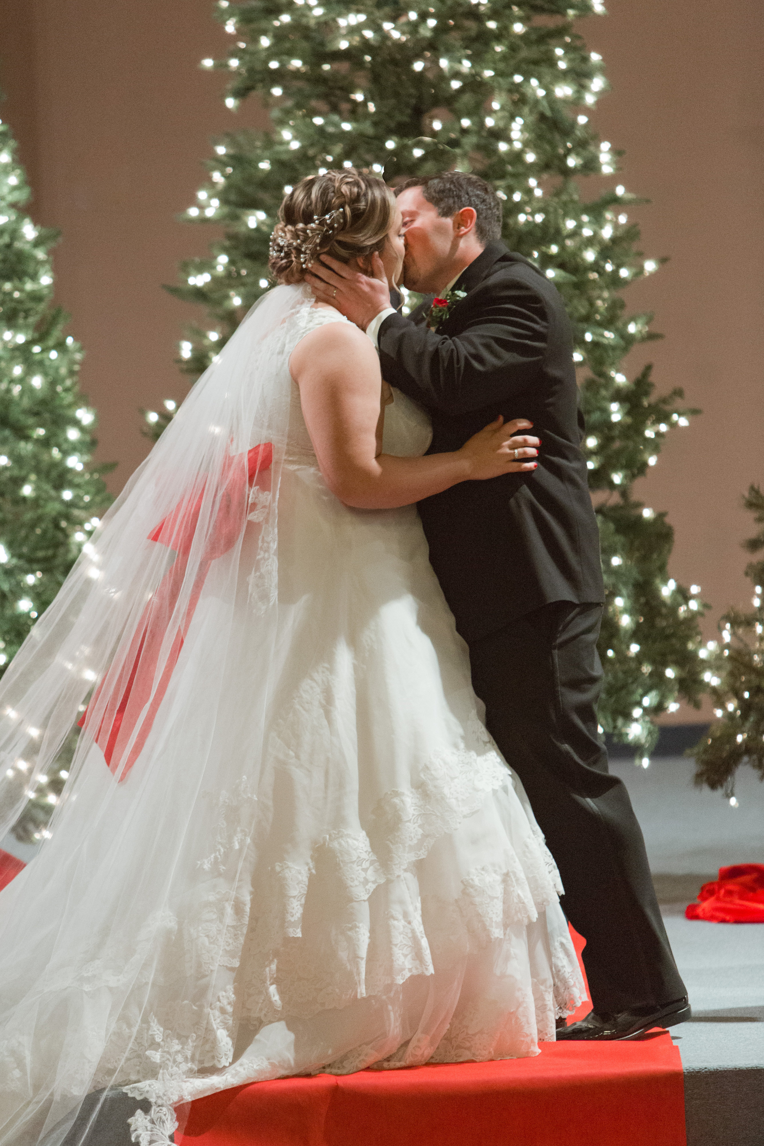 Red Roses, Wedding Bouquet, Tuxedo, First Kiss, Christmas Trees, Christmas Lights, Red sash, Groom, bride and groom, Engagement Ring, Red glitter, Keds, Kate Spade, Red Glitter Keds by Kate Spade, Red nail polish, Wedding, Wedding Ring, Red, Married, Wedding Dress, Ft. Meyers, Florida