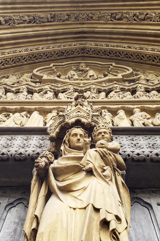 Sculpture above the door of westminster abbey in london